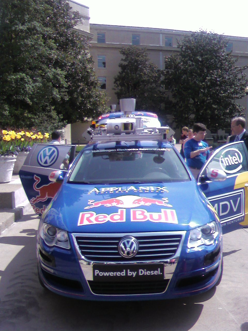 Illustration for article titled DARPA Urban Challenge Cars Invading Pentagon Parking Lot